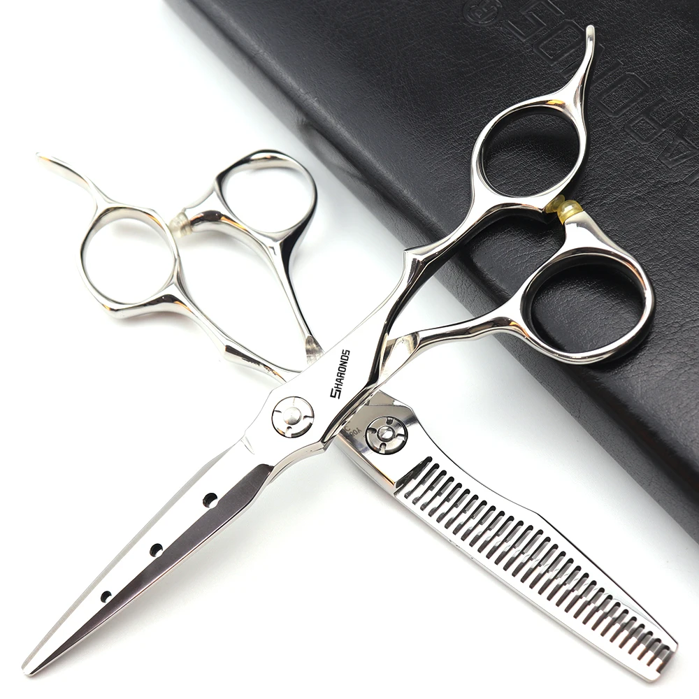 Professional hair clippers for thinning hair, flat teeth, bangs, and other hair cutting tools. Hair cutting and shredding set.