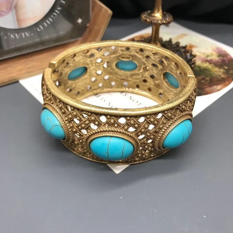 Vintage palace style  turquoise spring bracelet high quality handcrafted hollow pattern metal bracelet women fashion accessory