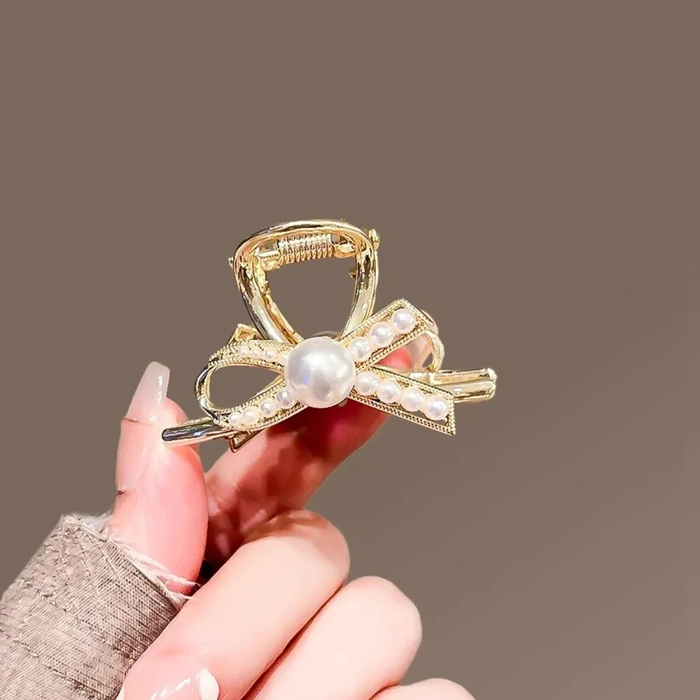 Gold Tone Double Prong Claw Clip with Simulated Pearl Center and Matching Simulated Pearl Bead Trim Ornamental Bow Design