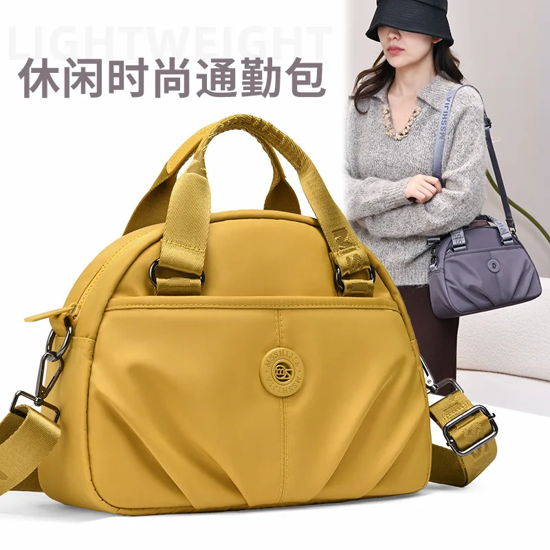 

Осенняя новая женская сумка для мамы, плиссированная большая сумка большой вместимости, портативная сумка через плечо, модная модель.