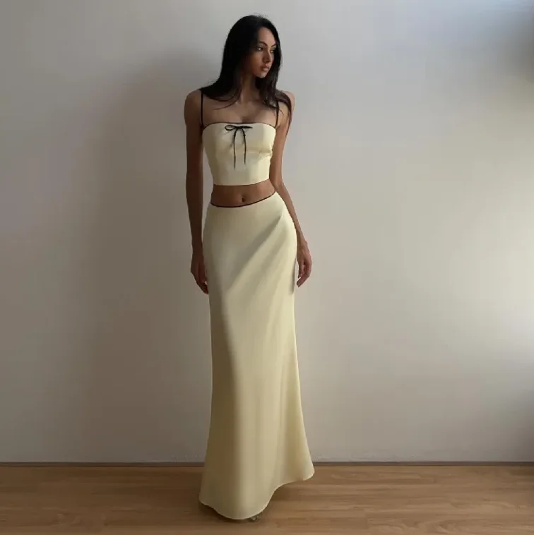 

Bow vest knee length long skirt set