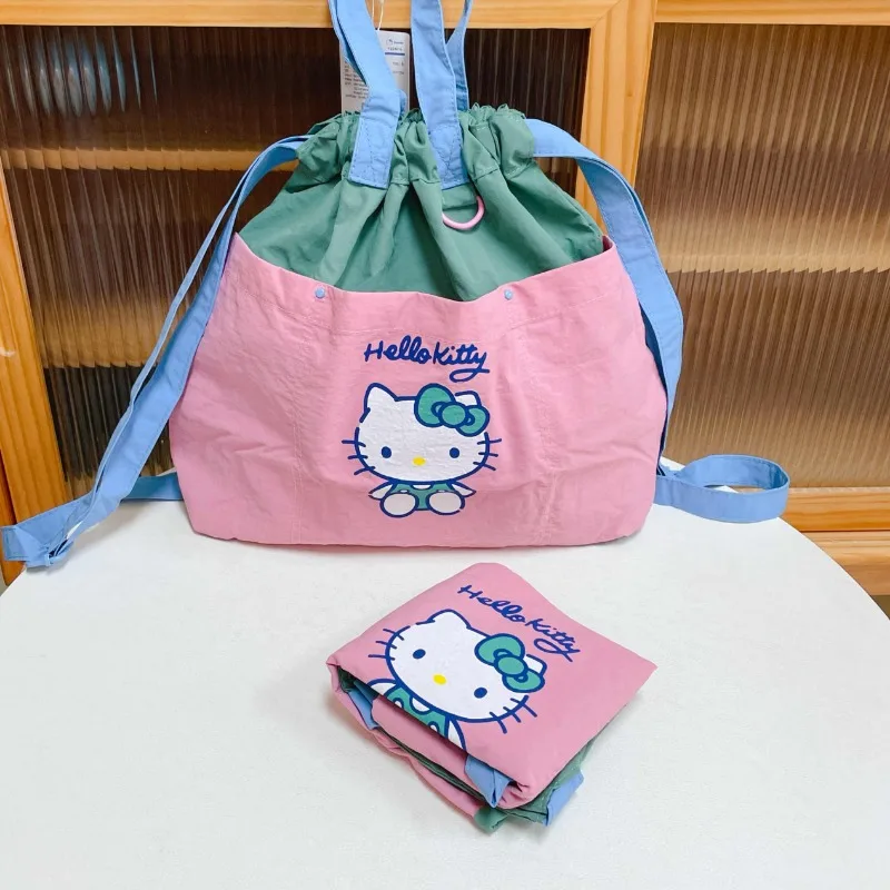

Hello Kitty Nylon Backpack Sanrios Kawaii Girl Drawstring Ties Storage Bag Large Capacity Waterproof Portable Folding School Bag