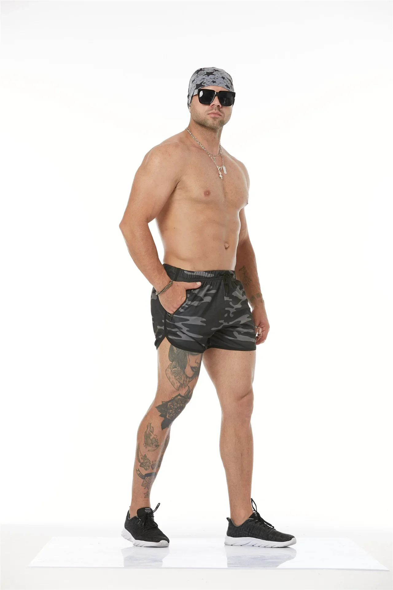 ยิมวิ่งกางเกงขาสั้นผู้ชายออกกําลังกายด่วนแห้งบางพอดีสบายๆชายหาดแสงกีฬากางเกงขาสั้นชาย