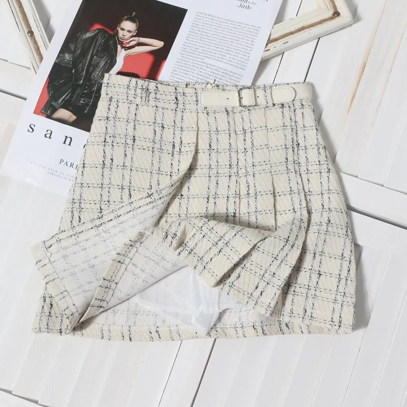 Media falda de lana a cuadros de otoño/invierno para mujer, falda acampanada plisada adelgazante de cintura alta, estilo pequeño fragante, 2025