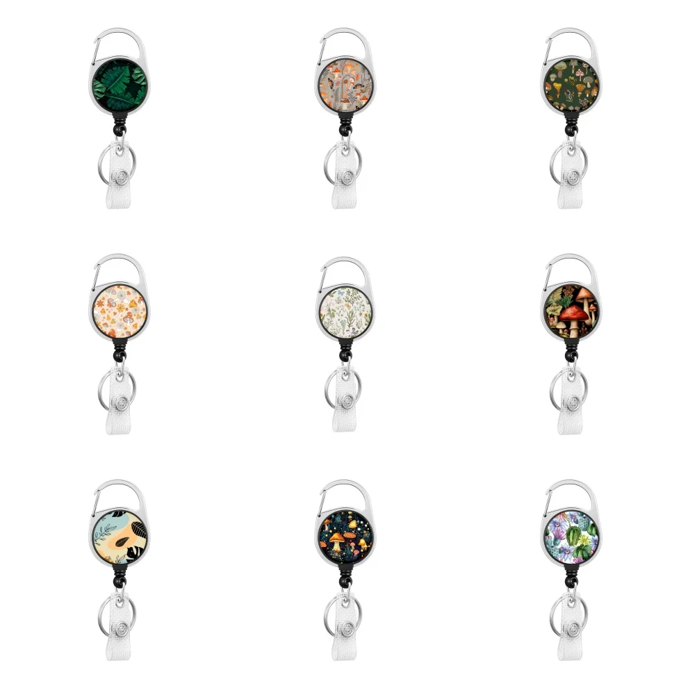 Hot selling circular Plants pattern Easy disassemble Zinc alloy badge automatic scroll easy pull buckle keychain H1205