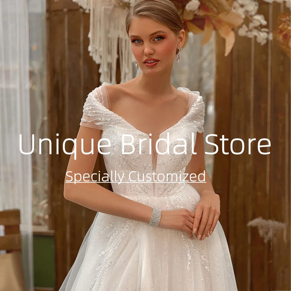 Abiti da sposa sexy personalizzati con spalle scoperte Elegante gonna divisa a trapezio aperta sul retro Bellissimo abito da sposa dal design applicato