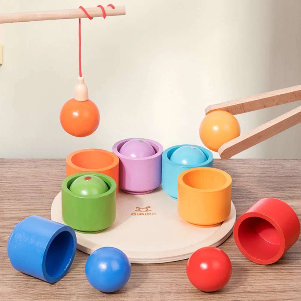 

Деревянная развивающая игрушка «Радужные шарики в стаканчиках» для развития логического мышления и сортировки по цветам для детей от 3 лет и старше
