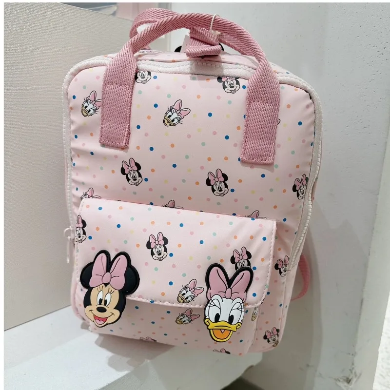 Disney-Mini mochila escolar de dibujos animados de Minnie para niños y niñas, bolso de hombro bonito de alta capacidad, viaje práctico, novedad de