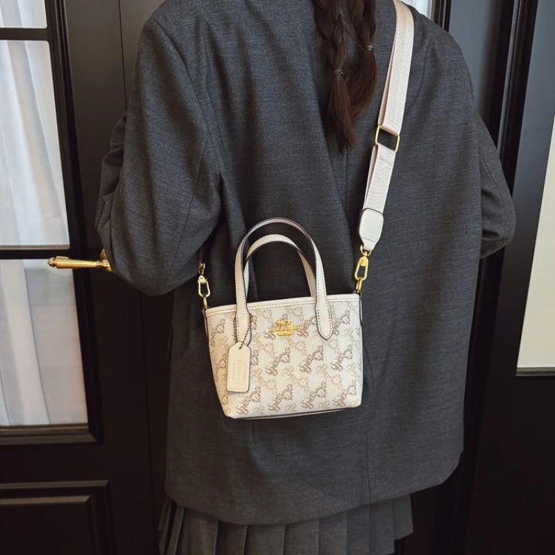 

Women's Handbag Made Of Sun-Patterned Leather Boasting Paris Commuter Vintage Look