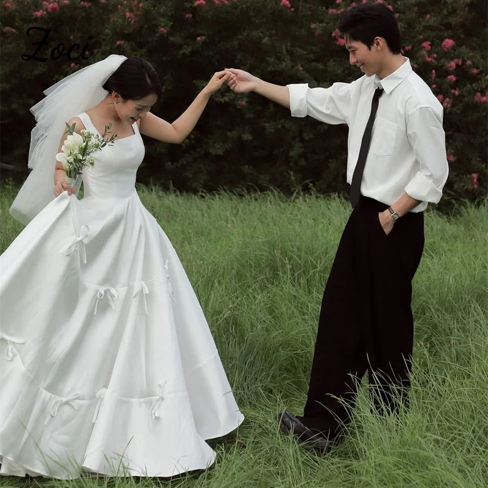 

Zoci Elegant Square Neck Satin Korea Wedding Dresses Ribbons Bow Customized A Line Bride Photos Shoot Dress Drapped Bridal Gown