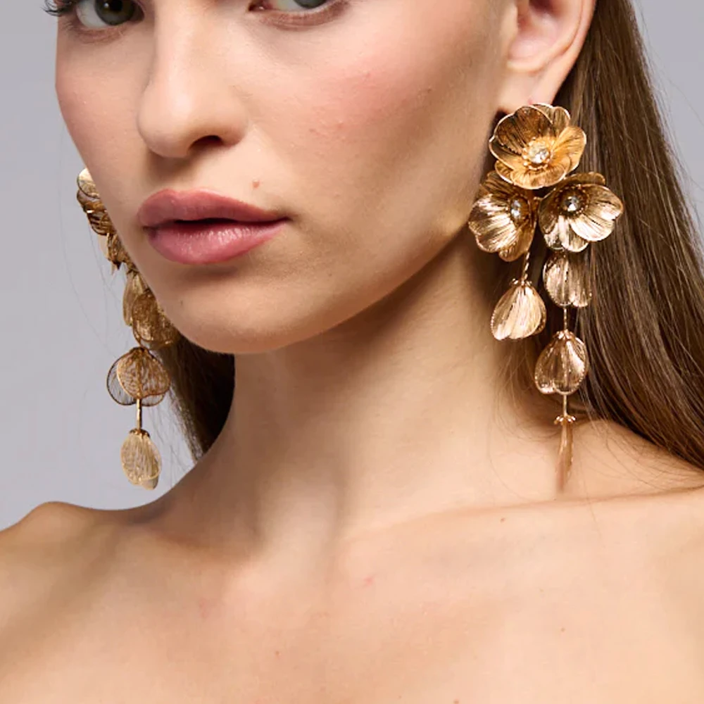 Boucles d'oreilles Vintage à pampilles longues en forme de fleur pour femmes, accessoires de personnalité, feuille creuse exagérée, boucles d'oreilles pendantes en métal, bijoux de discothèque