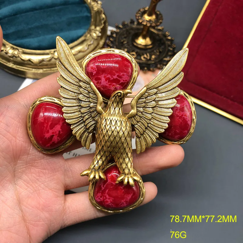 

European and American fashion jewelry, retro eagle relief brooch, red stone inlaid exquisite pin for women