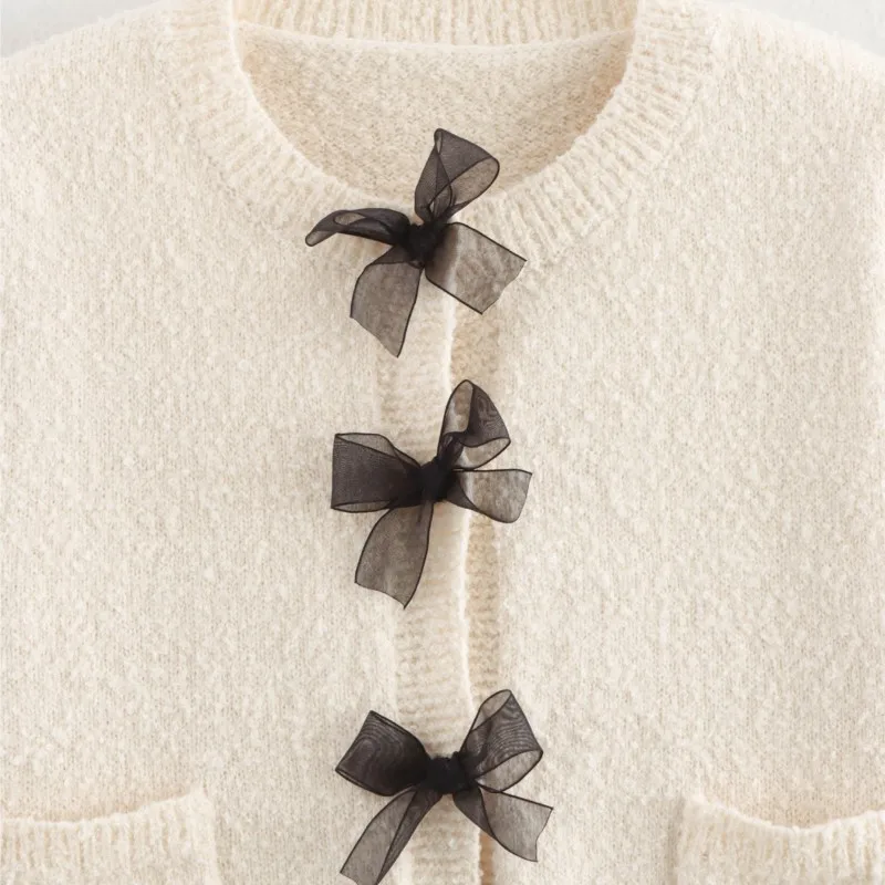 Set di gonne corte maglione lavorato a maglia morbido beige autunno inverno giacca con fiocco in rete dolce + gonna sottile con nappe abiti da donna di moda