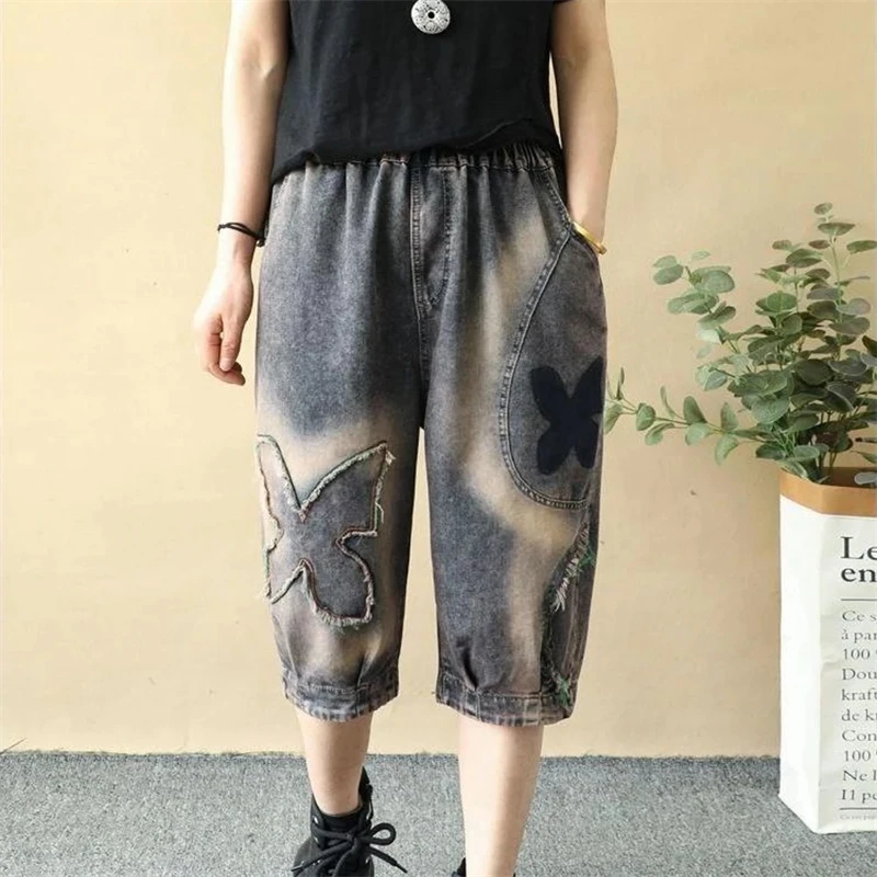 Women's Jeans Retro Four-leaf Flower Butterfly Raw Edge Denim Pants Loose Six-point Pant Roll Edge Harlan Trousers Female Trend