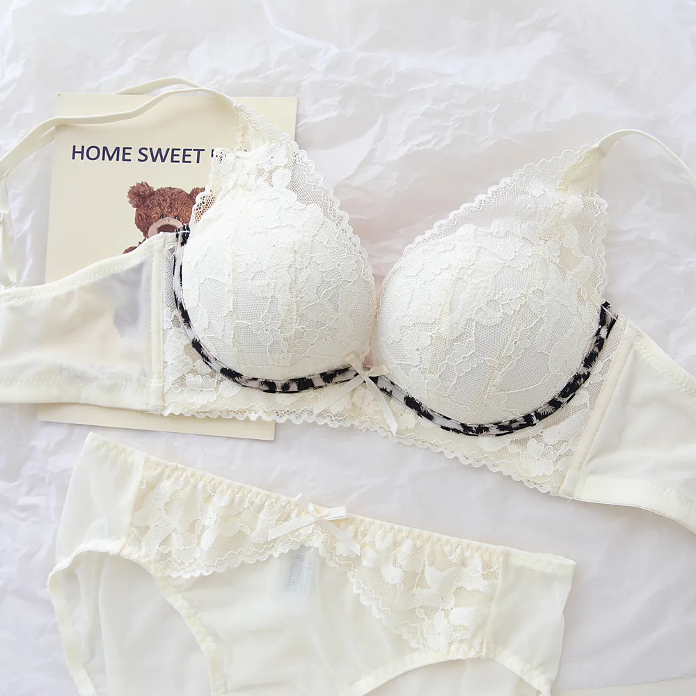 Sexy women's lingerie set. Wireless lace bra with double shoulder straps, designed to lift, gather and prevent sagging for small