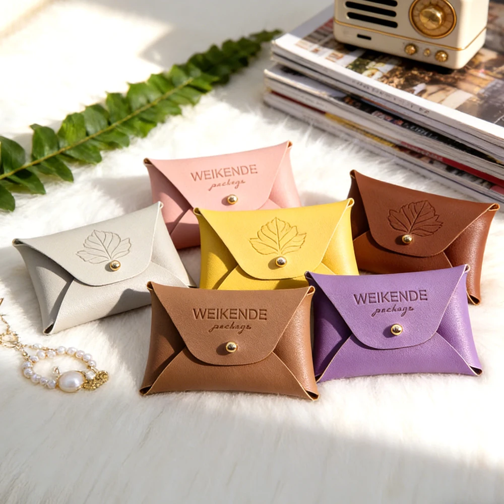 

50Pcs 7x5cm 10x7cm Luxury PU Leather Jewellry Dustproof Storage Pouch Custom Logo Small Earrings Ring Necklace Coin Gift Wrap