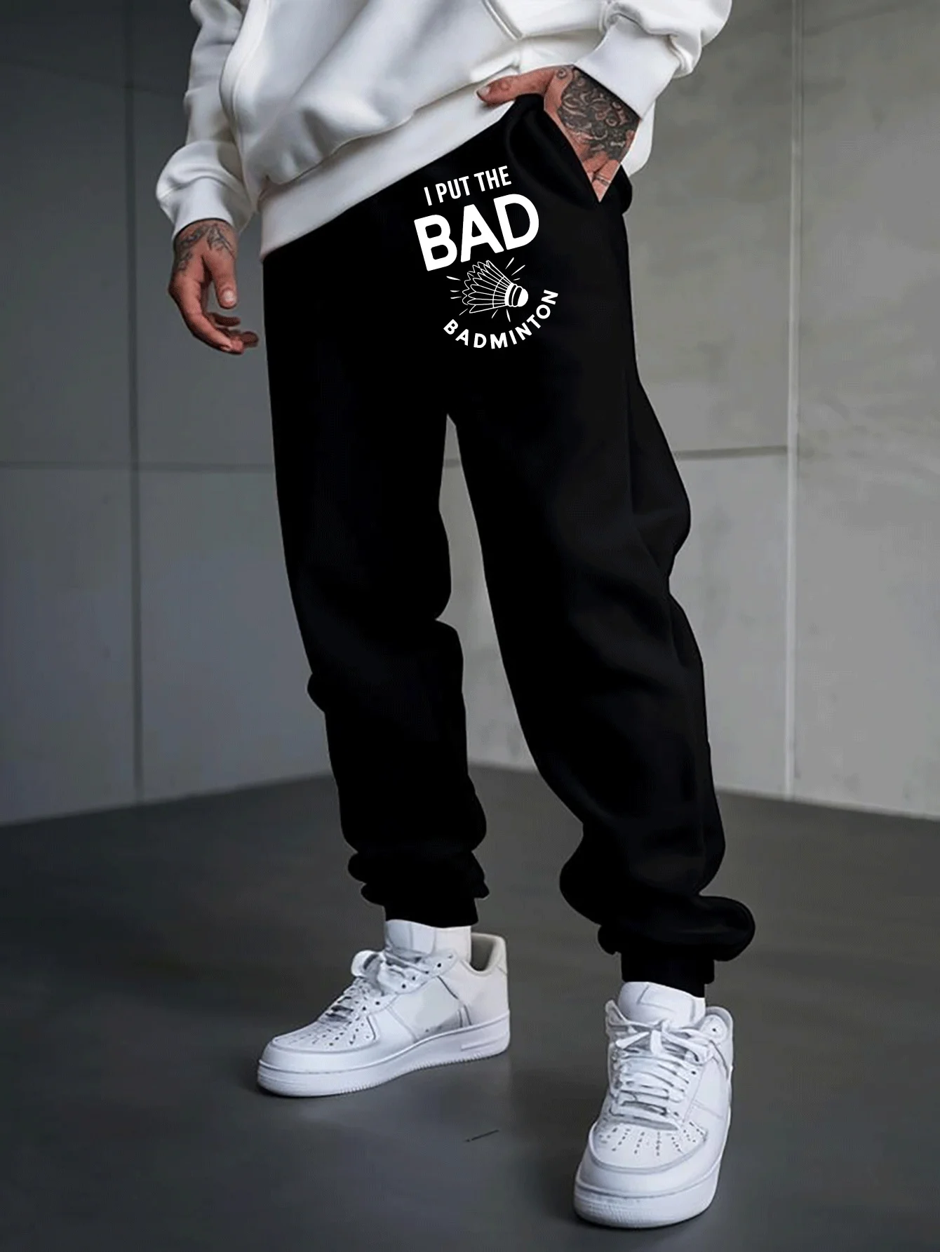 Hobby‑crafted I Put The Bad Badminton Humorous Sports Slogan Motif Print Casual Pants Men Weekend Sport Jogger Trousers