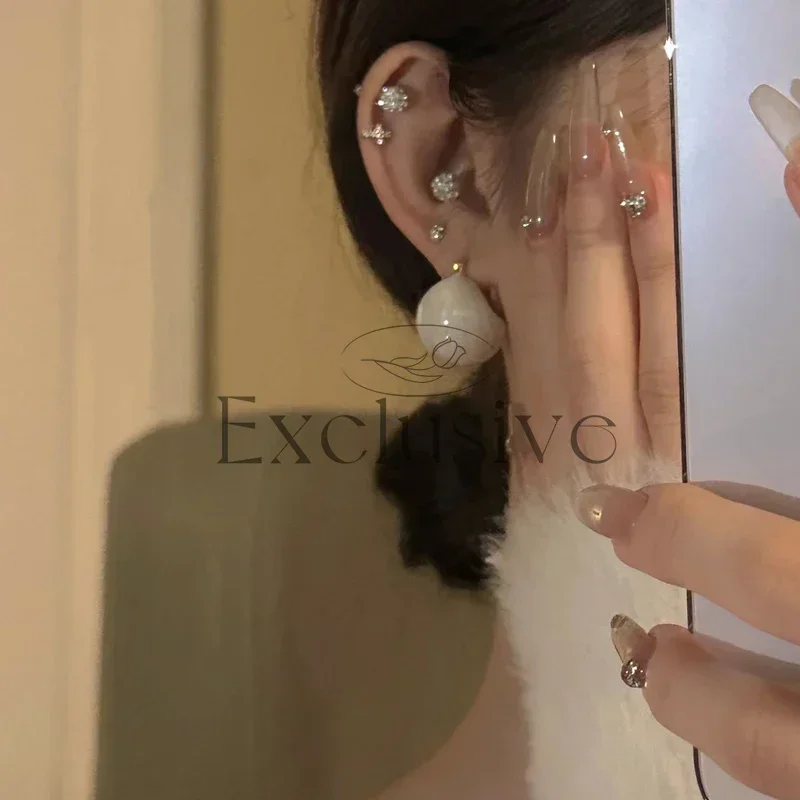 Retro fashionable enamel circle white earrings simple niche design cold wind