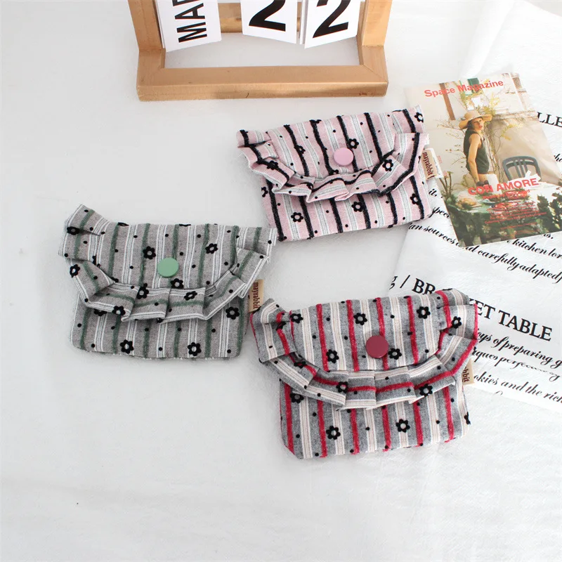 Striped small flower coin purse, portable large capacity flip button storage bag, girls' headphone lipstick makeup bag
