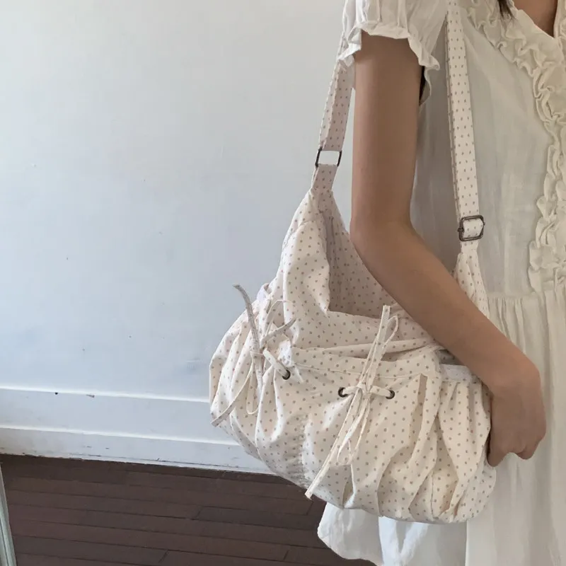 Korean-style niche large-capacity polka dot canvas bag with bow, versatile for girls, suitable for commuting, shoulder or crossb