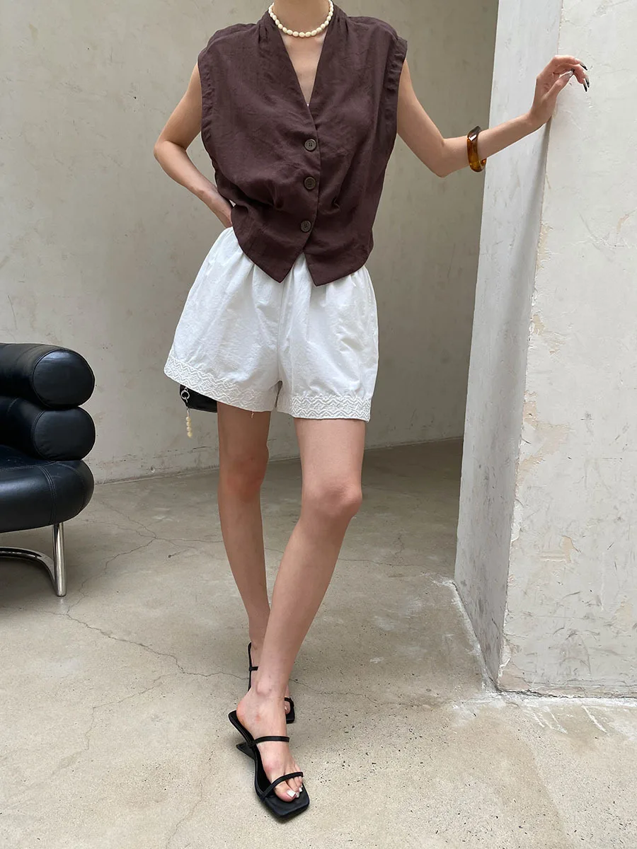 Sommerliche Damen-Shorts in unifarbenem Design mit elastischem Bund, besticktem Patchwork, lockerer Passform und weitem Bein. – Detail 21