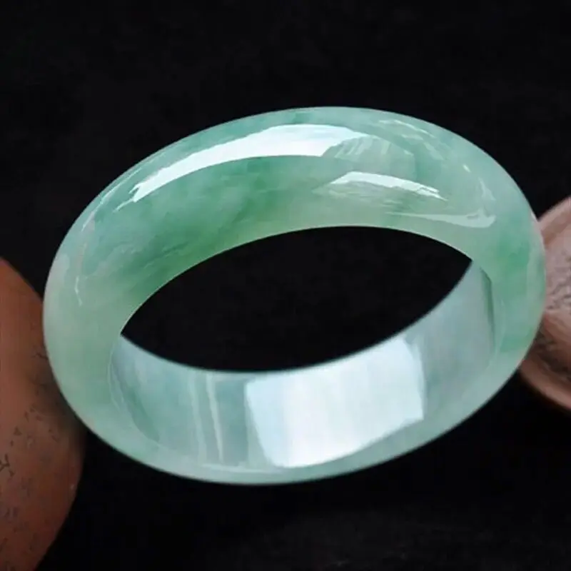 Myanmar natural jade bracelet, old mine, ice-type, light green, with oil-like inclusions, wider design, featuring floating patte view 2