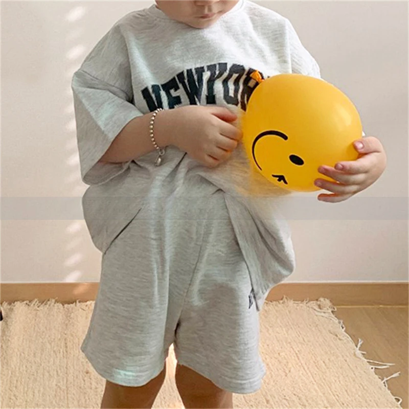 2024 New Summer Suit for Boys and Girls Cotton Short Sleeved Shorts Loose Fitting Childrens Two-piece Set