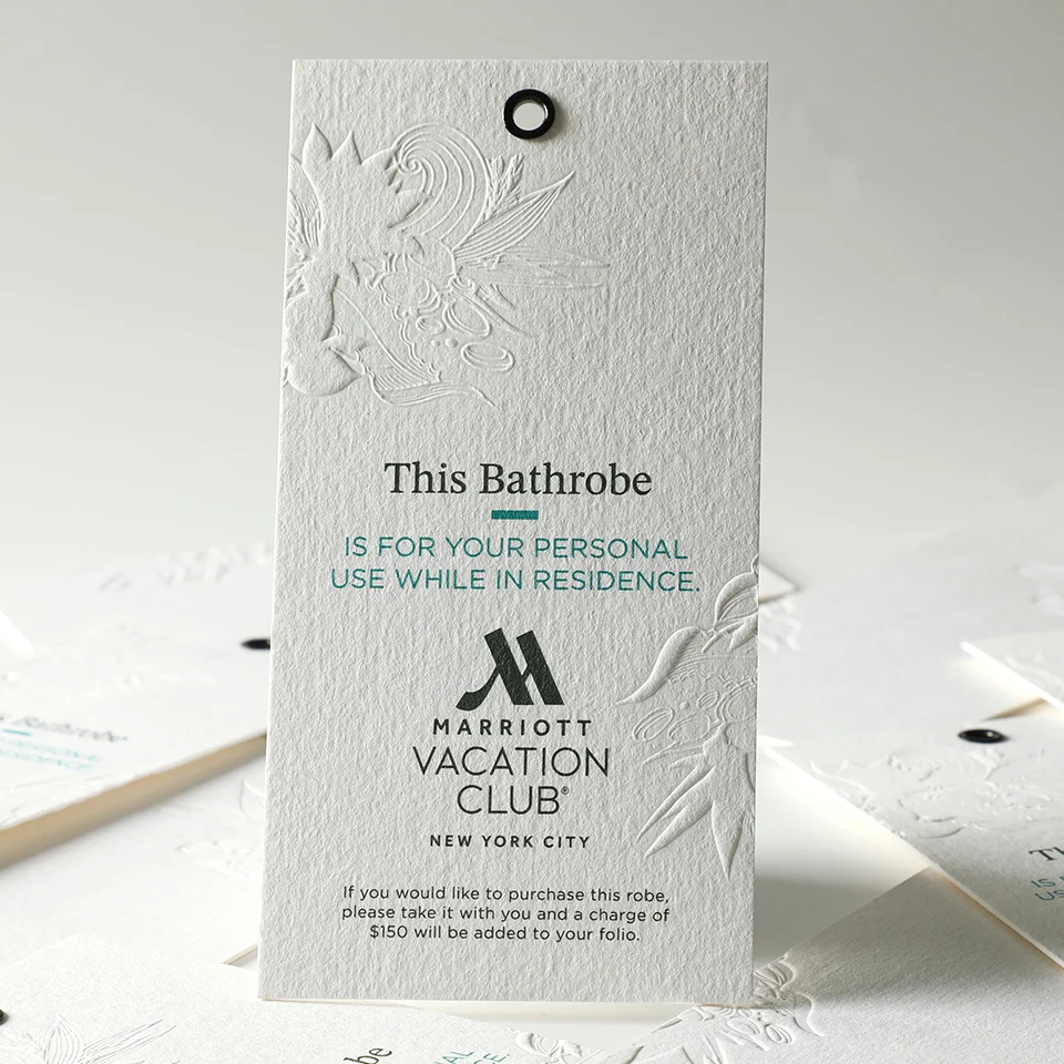

Custom Brand Logo Embossed Printing Art Paper Swing Hang Tag for Clothing Garment Tags With Cotton String
