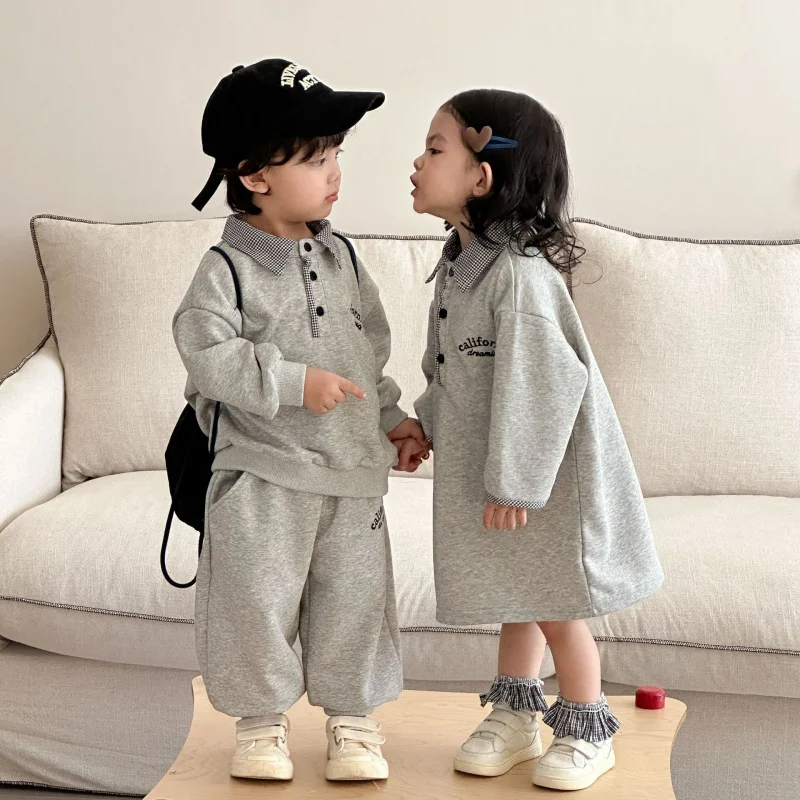 

Children's Spring and Autumn Sweatshirt Set for Boys' Sports2026New baby plaid dress for girls, brother and sister spring outfit