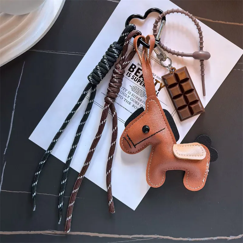 الإبداعية لطيف المهر حقيبة سحر الملونة المنسوجة حبل المهر الشوكولاته المفاتيح 2026 السنة الجديدة من الحصان التميمة الأطفال هدية حفلة