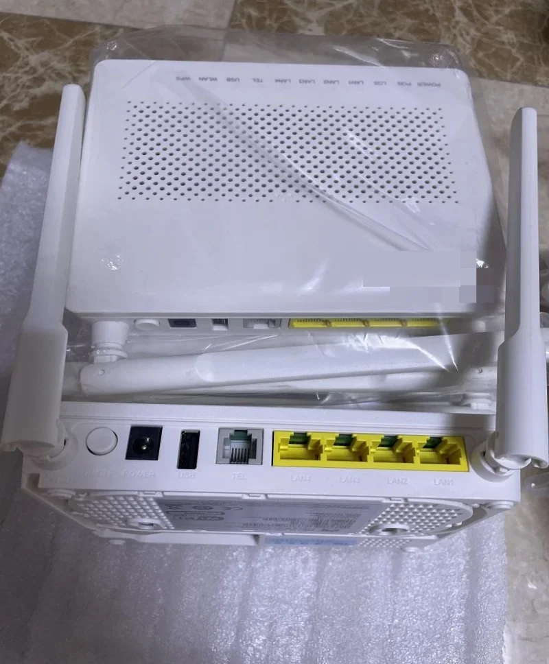 100% NEW Original EG8141A5 Gpon XPON ONU FTTH Modem Router Bare Metal + Adapter 1GE + 3FE + Wifi +1tel With English Software