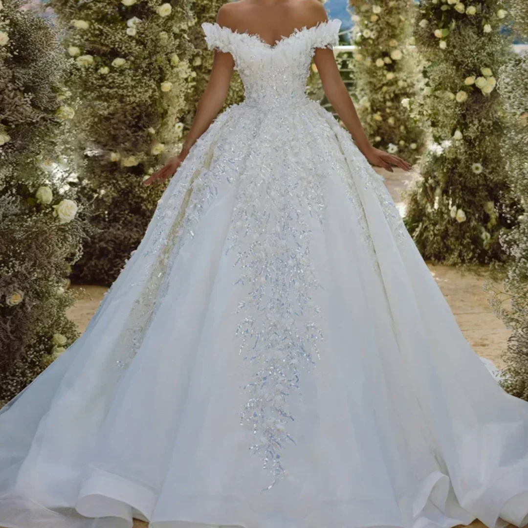 فاخر بلا أكمام قارب الرقبة العروس زيبر فستان الزفاف الأورجانزا مع التطريز الترتر الكرة ثوب مخصص