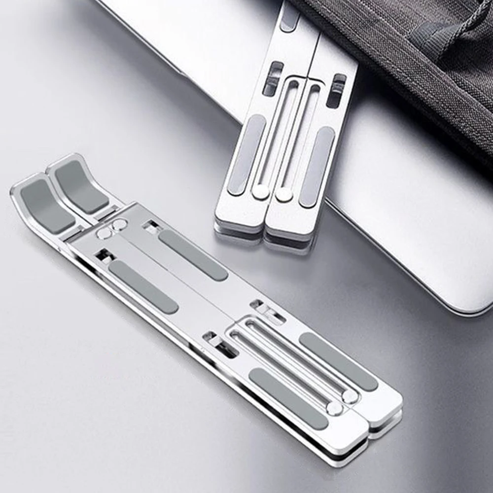 

Алюминиевая подставка для ноутбука ​ ​ ​ ​ Складная конструкция ​ ​ ​ ​ Легкая подставка ​ ​ Регулируемый держатель для планшета ​ ​ Распределение тепла ​ ​