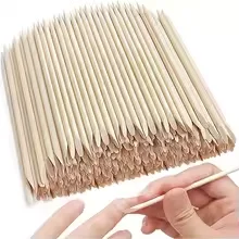 

Premium 11.4cm dual-ended orange wood sticks for precise cuticle care, nail art application, and cleaning. Ideal for salons and