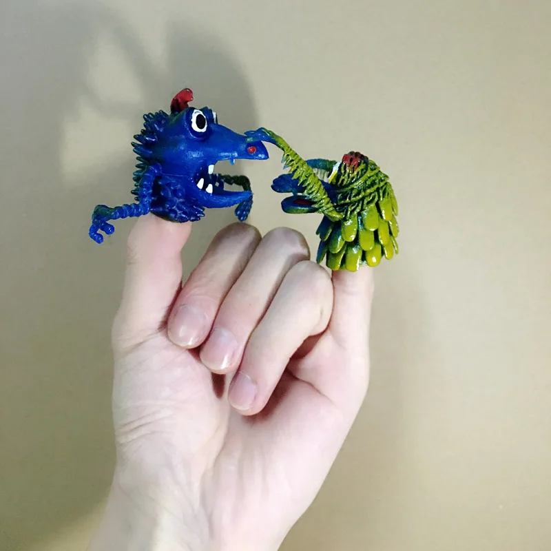 1 Set The New Strange Compulsion Simulation Animal Finger Cover puntelli TPR Small Monster Hand Puppet Finger Puppet Toys