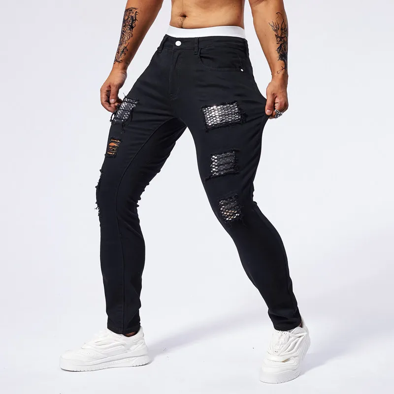 

Черные потертые рваные облегающие джинсы скинни, мужские модные длинные брюки из эластичной ткани, металлические заклепки, нашивки, украшенные колено