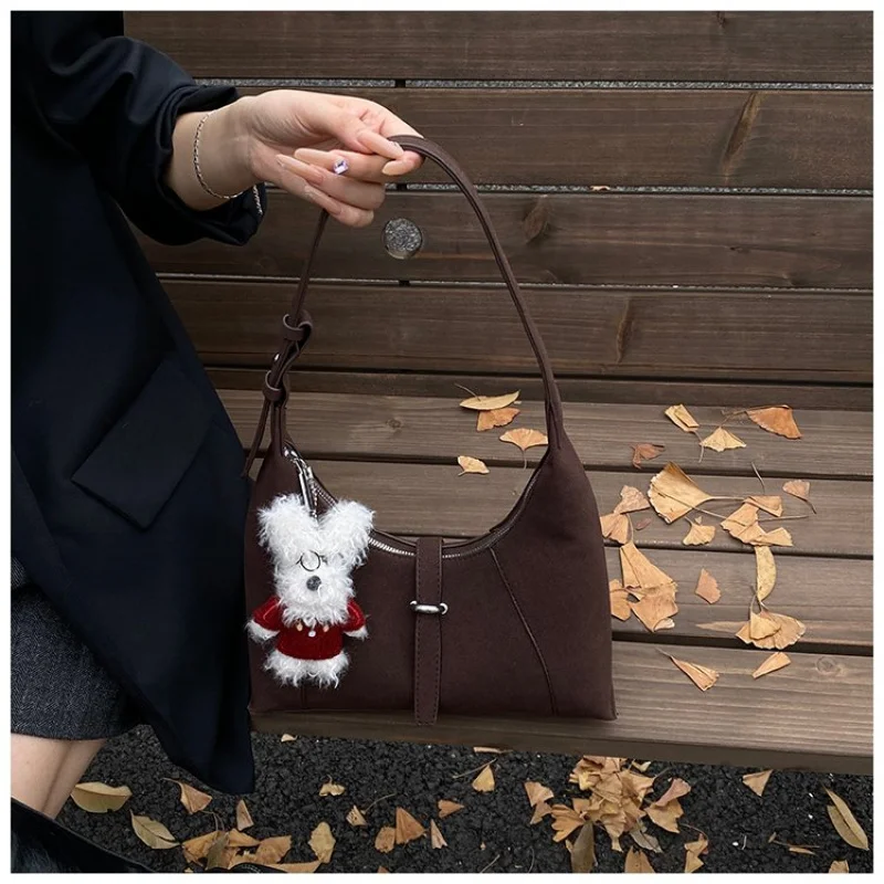 

Elegant Tassel Accent Clutch Bag For Women Designer Inspired Leather Detail With A Long Decorative Zip Tassel