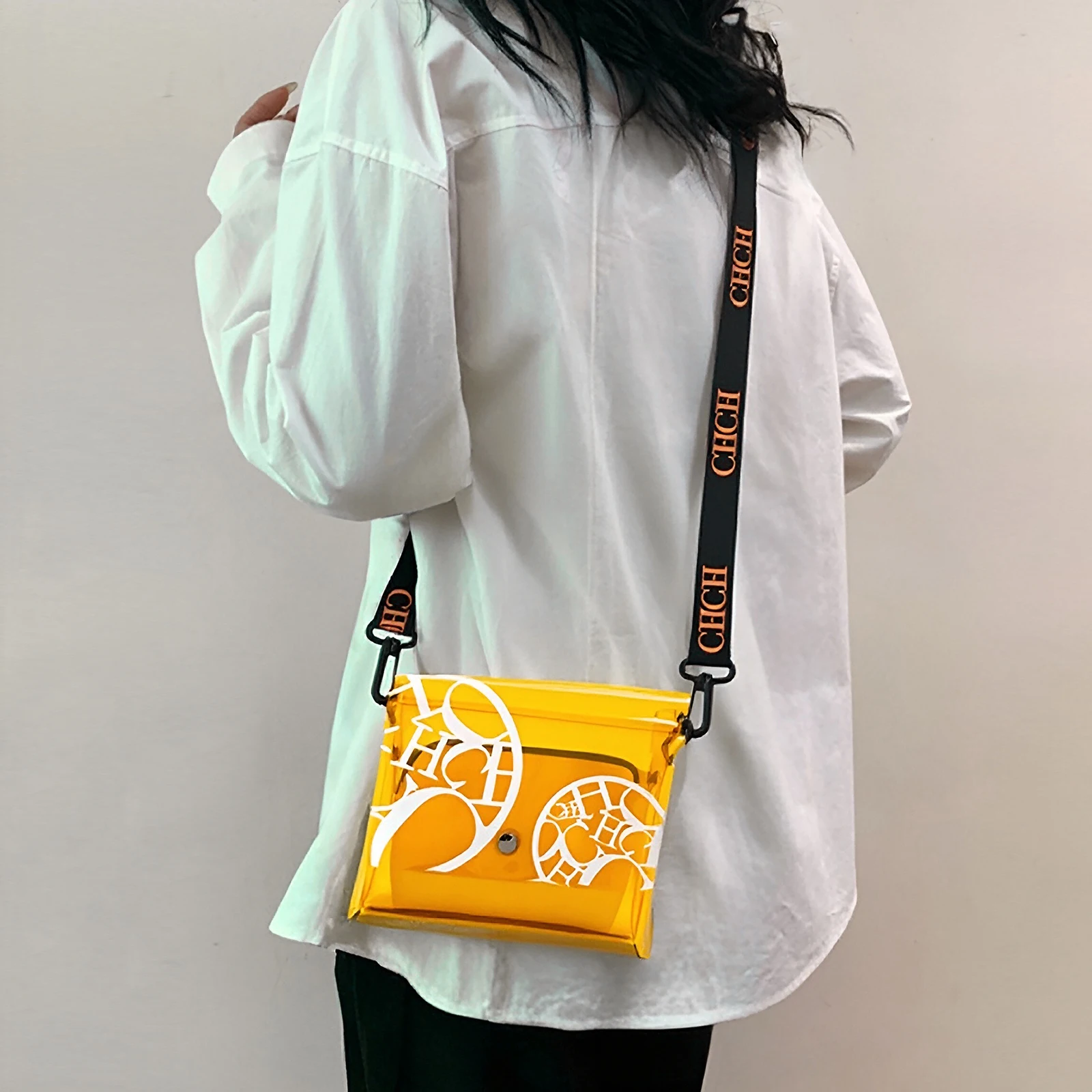 Vibrant Yellow Transparent Tote Eye - Catching Design with Artistic White Patterns, Sleek Functionality and Chic Metal Accents