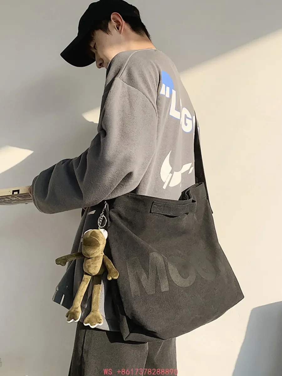 Canvas bag Men's messenger bag Large capacity Japanese boys diagonal backpack Women's casual mailman Student men's shoulder bag