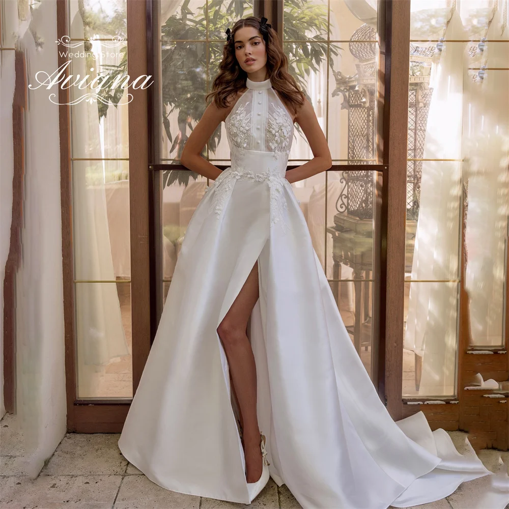 Aviana ที่กําหนดเองลูกไม้ Appliques สูงด้านข้างแยก A-Line ชุดแต่งงาน Sweep Train ความยาวชั้นเย็บปักถักร้อยแขนกุด Elegant