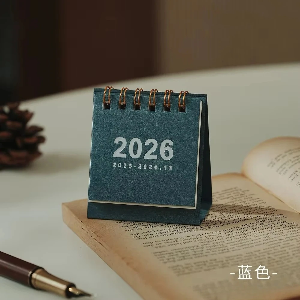 ปฏิทินตั้งโต๊ะขนาดเล็ก สีพื้นเรียบง่าย ปี 2025-2026 พร้อมตารางวางแผนรายวันแบบคู่ วางแผนรายปี
