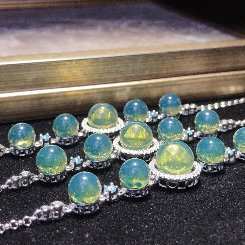 8-10mm Mexican Blue Amber Inlaid S925 Silver Bracelet with Natural Topaz Five Blessings