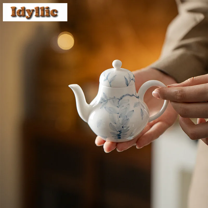 

135ml Hand-painted Blue And White Wisteria Teapot Creative Tea Infuser Pot Tea Making Kettle With Ball Hole Chinese Teaset Craft
