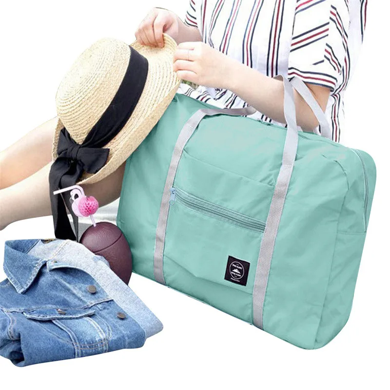 Solid color foldable travel bag Men's and women's clothing bag Shopping shoulder bag with large pull-over luggage bag