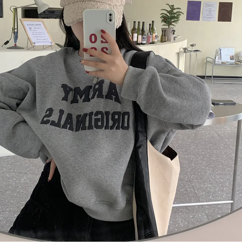 

"Vintage-Inspired Fleece Sweatshirt. Cozy, soft-brushed interior with a relaxed Korean fit."