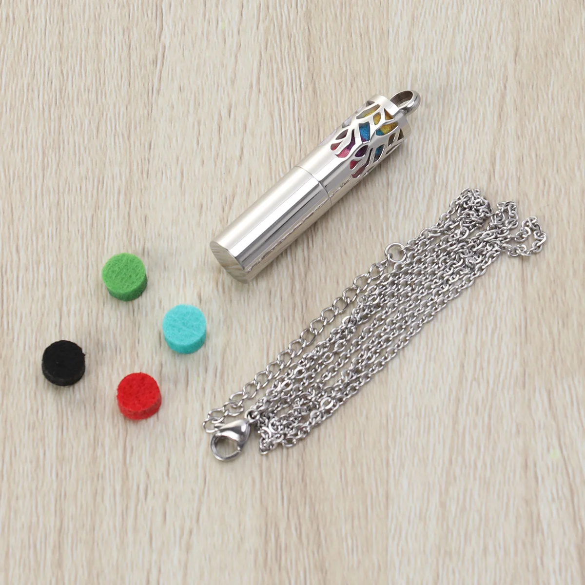 

Aromatherapy Diffuser Necklace Set Stainless Steel Hollow Cylindrical Pendant with 8 Color Refill Pads Chain