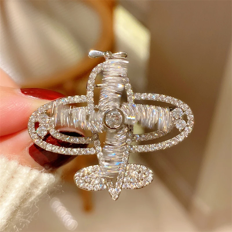 

Роскошная вращающаяся брошь-самолет с паве-покрытием, посеребренная, с блестящими кубическими циркониями, для женщин, для вечеринок и повседневного использования