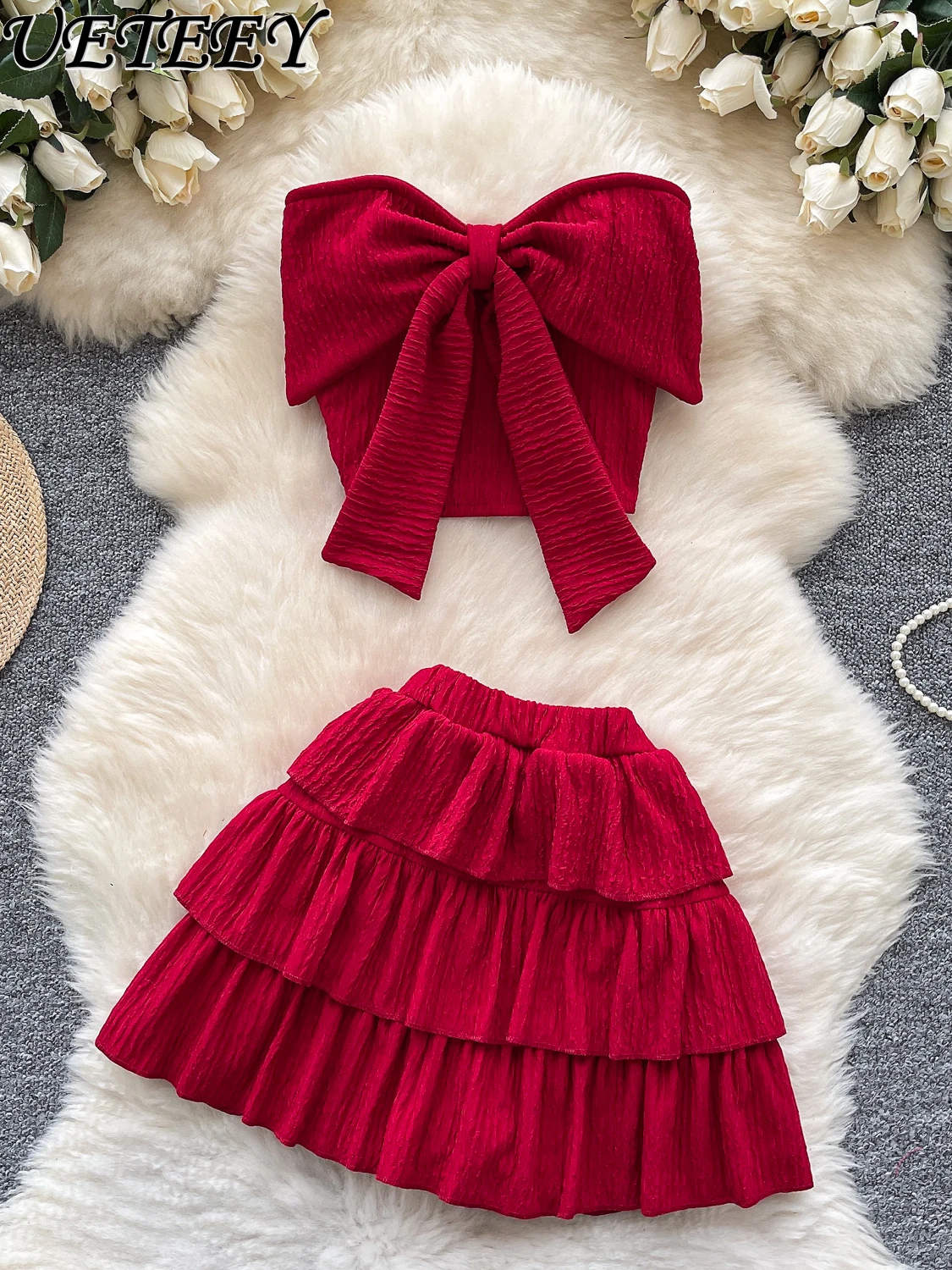 

Сексуальный женский летний дизайн для девочек с большим бантом, топ без рукавов, жилет, юбка, комплект из 2 предметов, мини-юбка с высокой талией и рюшами, костюм