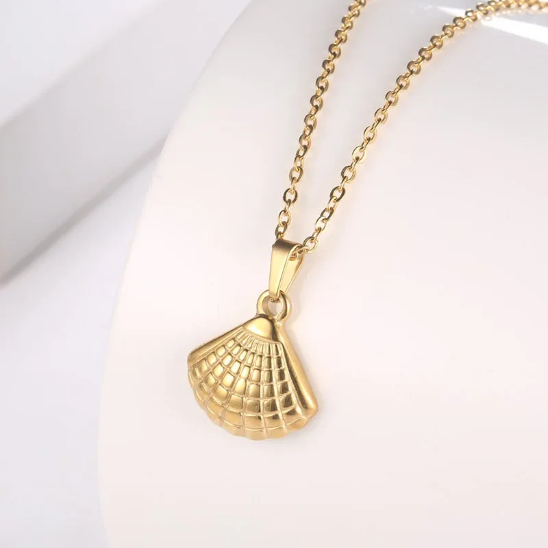 IMI الجنكة بيلوبا قلادة التيتانيوم الصلب قسط الفرنسية المتخصصة الإناث اللؤلؤ مروحة الترقوة الإضافية قذيفة YL030