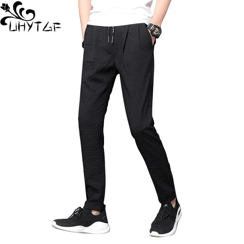 

UHYTGF Summer Pants Men's Solid Color Tether Casual Breathable Ice Silk Sports Trousers Male Thin 5XL Large Size Cargo Pants 356